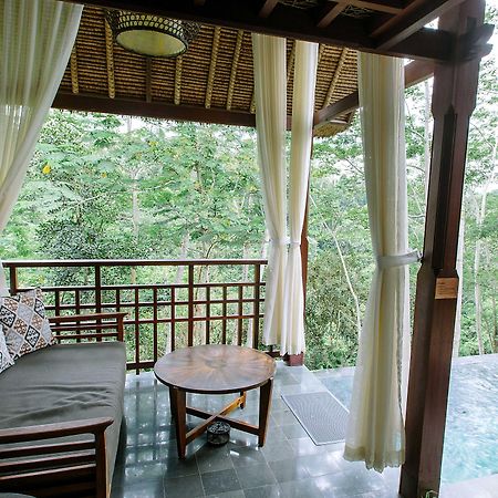 Tejaprana Resort & Spa Ubud Exteriér fotografie A view of the pool at the resort