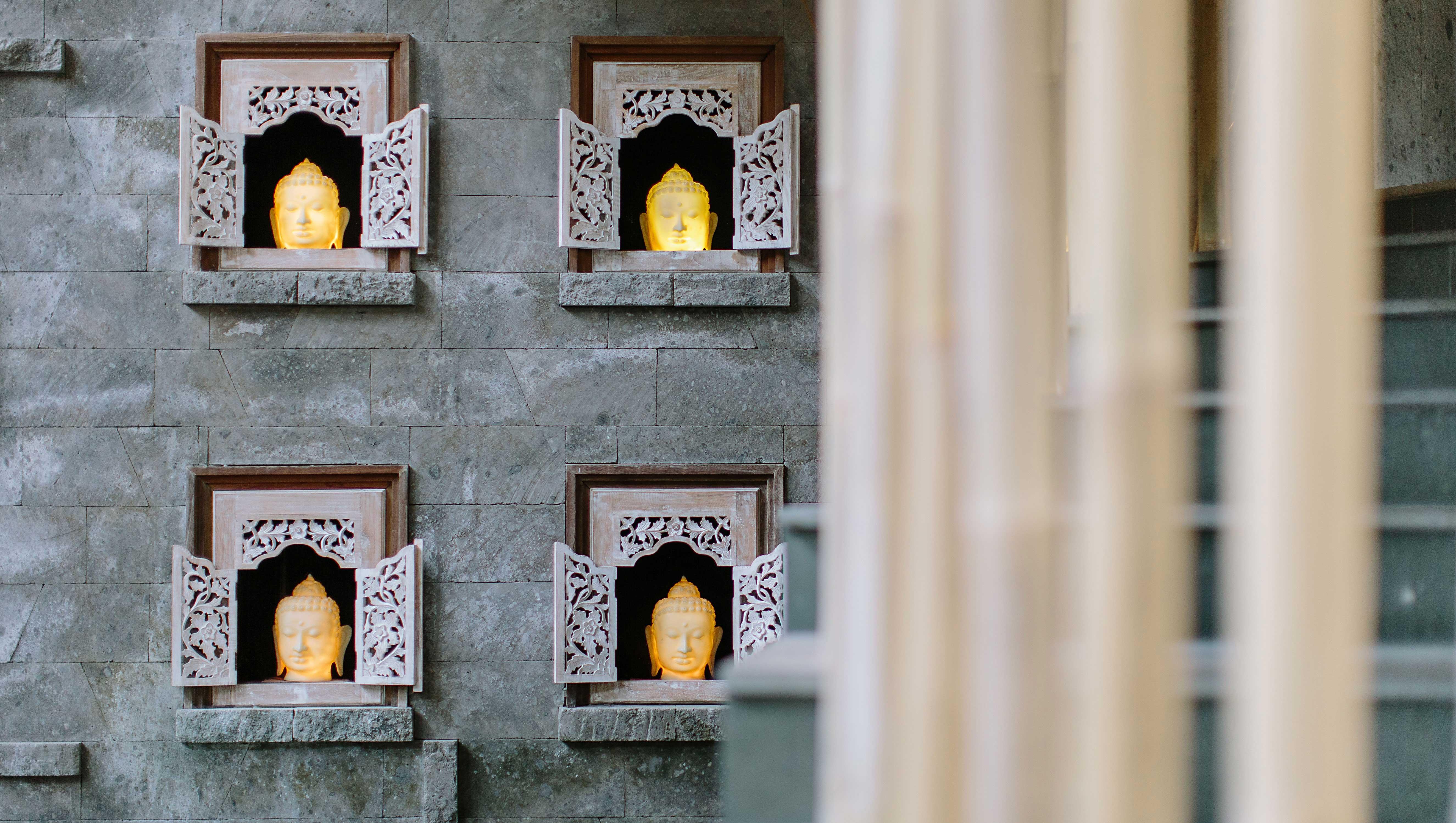 Tejaprana Resort & Spa Ubud Exteriér fotografie The four faces of the Buddha