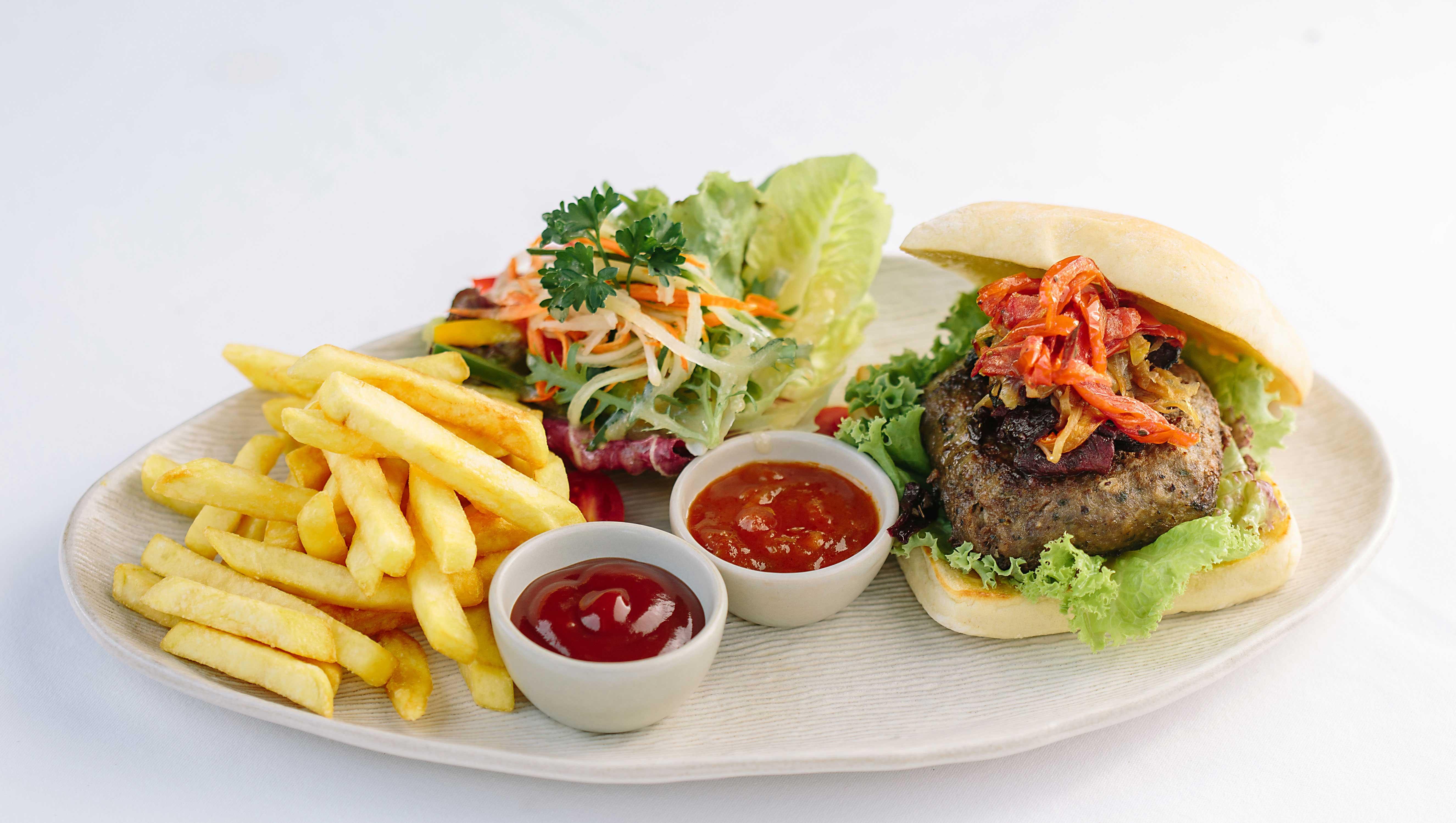 Tejaprana Resort & Spa Ubud Exteriér fotografie A hamburger with chips and salad